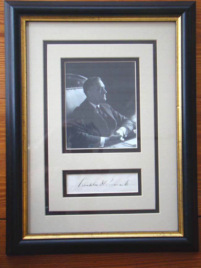 A framed photograph and signature of President Franklin D. Roosevelt circa 1935-1940